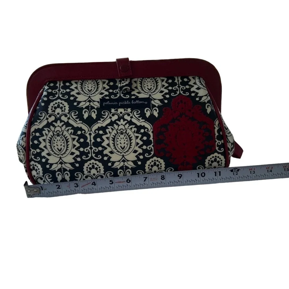 PETUNIA PICKLE BOTTOM red and black diaper changing clutch bag